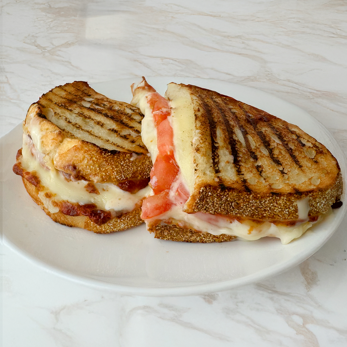 Wednesday Sandwich of the Day: Cooper® Sharp American &amp; Sliced Tomatoes w/ Salt &amp; Pepper on a Sourdough Casa (Hot Pressed)