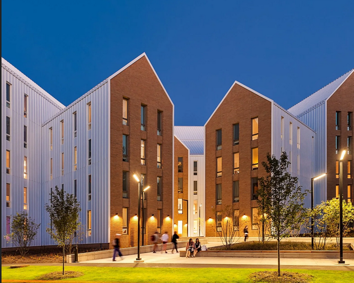 Bimiphant's tweet photo. Olympia place, Amherst MA
What was the cause of fire?

73 units 98,000 SF wood construction (Type III)
"LEED Midrise Gold certification, Efficient mechanical  systems, LED lighting, Energy Star appliances, and low-flow fixtures  further reduce energy and water consumption." https://t.co/e29jCV21Qw