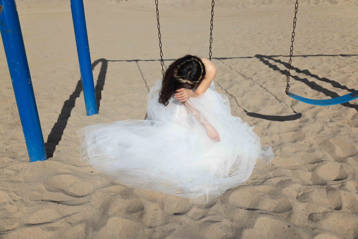 updaterosalia's tweet image. New photo of ROSALÍA from the LUX photoshoot, wearing a wedding dress for the visuals of “La Perla”. 🪽