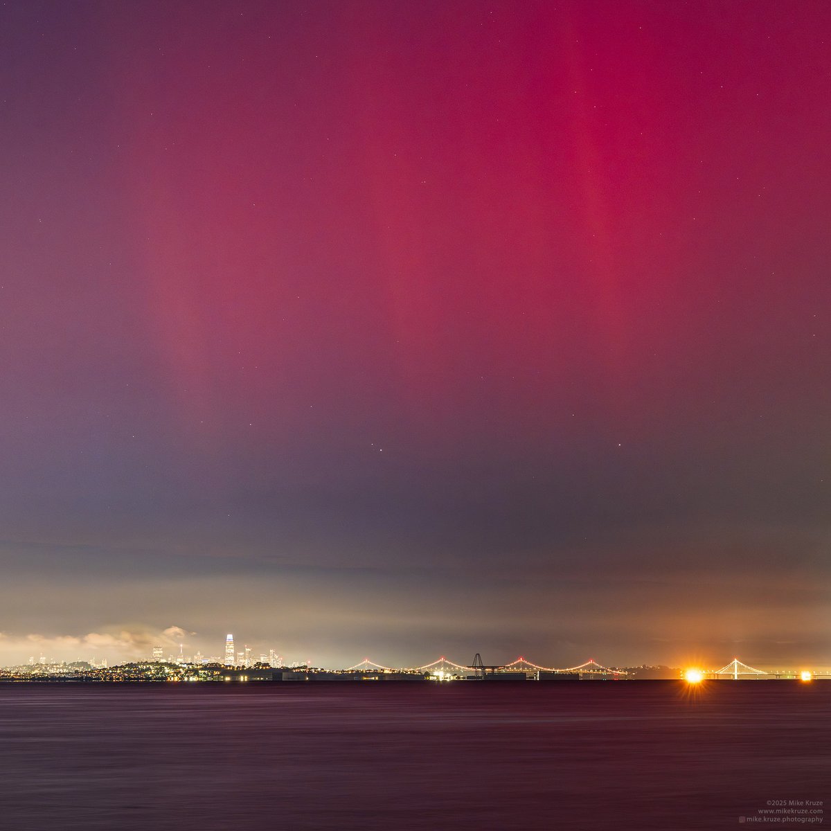 Last night's aurora over the Bay Bridge and skyline of San Francisco. Amazing to see them this far south and through all of the city lights! #cawx