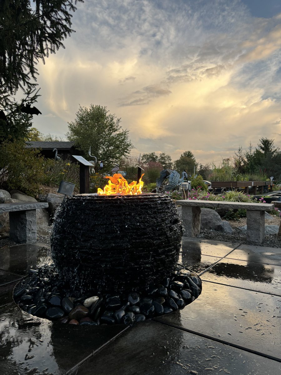 GardenStateKoi's tweet image. The perfect feature for chilly nights outside 🔥💧 #FireAndWater #BackyardOasis #WaterFeature