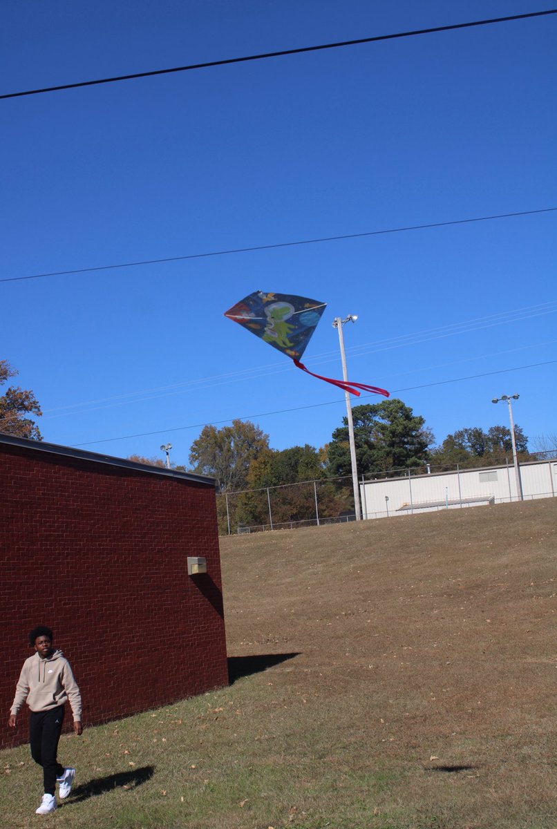 RipleyHS's tweet image. Mrs. Cross’s geometry students took their lesson to new heights—studying kite angles by flying a teal one! 📐🪁 From rectangles to squares to kites, their geometry skills are sky-high! 🖤💛 #STEM #GeometryInAction