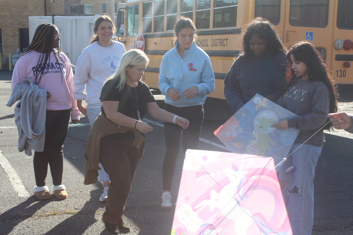 RipleyHS's tweet image. Mrs. Cross’s geometry students took their lesson to new heights—studying kite angles by flying a teal one! 📐🪁 From rectangles to squares to kites, their geometry skills are sky-high! 🖤💛 #STEM #GeometryInAction
