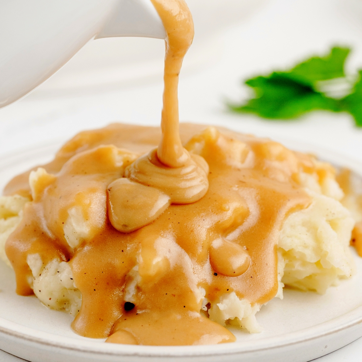 Make Ahead #Turkey Gravy made from roasted turkey wings. No drippings, no stress. Deep flavor, silky texture, and ready days before Thanksgiving dinner. #NoblePig Recipe: noblepig.com/make-ahead-tur…