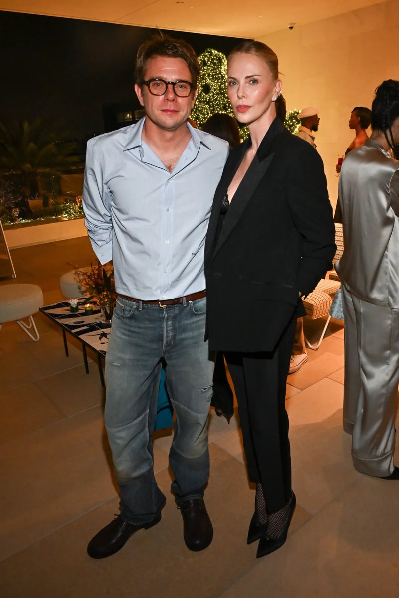 Jonathan Anderson and Charlize Theron at the Dior VIP Dinner held at the Dior Flagship Store in Beverly Hills.
