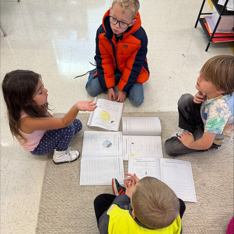 AthensCitySch's tweet photo. Ms. Ratcliff’s class today completing a science talk on why it looks like the moon changes shape! We’re learning all about the moon’s phases and how the sun’s light helps us see different parts of it each night. 🌕🌗🌘🌑#ExcellenceIsACP https://t.co/0NsDlNQAUs