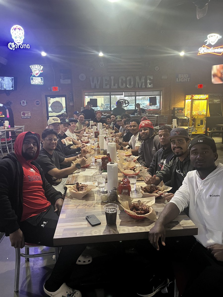 Fall World Series Champions dinner. Team Red enjoying some wings ! Go Aggies!