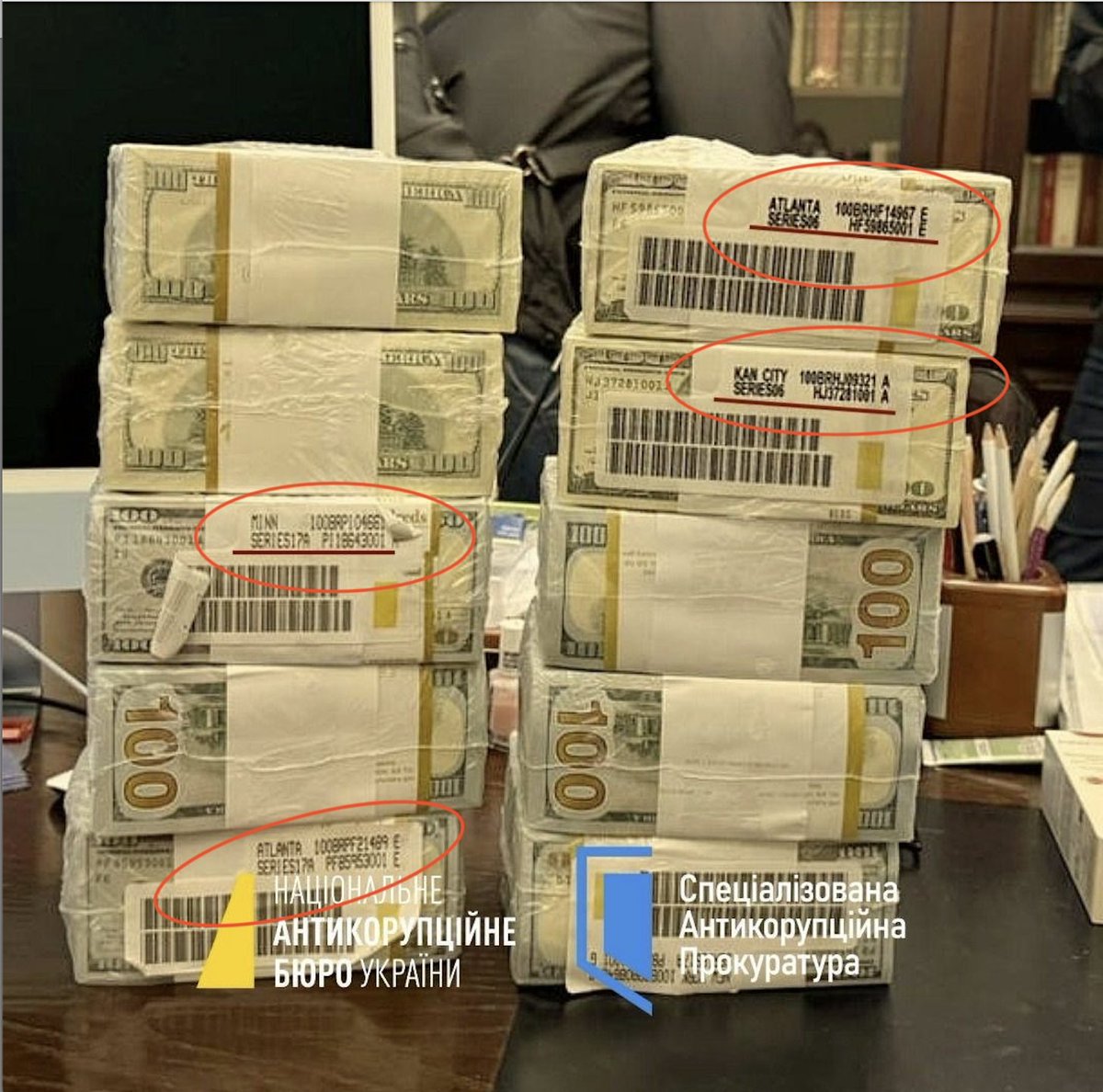 Zelensky may see the <a href="/nab_ukr/">NAB Ukraine</a>  investigation as a minor nuisance - until the <a href="/FBI/">FBI</a>  gets involved.
And by all appearances, that seems to be the plan.
The stacks of cash shown during the raids had American serial numbers, and Minister of Defence <a href="/rustem_umerov/">Rustem Umerov</a> , who is a U.S.