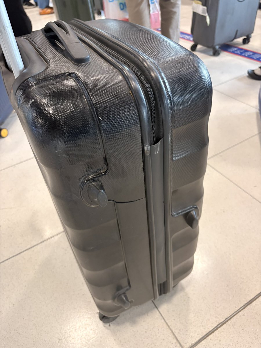 hrkhanna's tweet photo. @IndiGo6E Absolutely pathetic luggage handling. My suitcase came out cracked and wrecked after your BLR-BKK flight 6E1055 on 13th November. Do you people even care how passengers’ belongings are treated? This is unacceptable. I expect full compensation for the damage, and fast. https://t.co/NXc1KO0afL