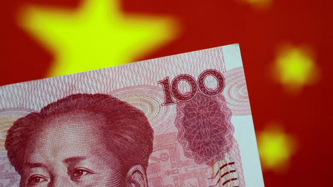 First image shows Xi Jinping a middle-aged Asian man with short black hair wearing a dark suit white shirt and blue tie standing in front of two large red Chinese national flags with yellow stars. Second image depicts a close-up of a pinkish 100 Yuan banknote featuring a portrait of a man with short hair and a blurred background of yellow stars on red resembling the Chinese flag.