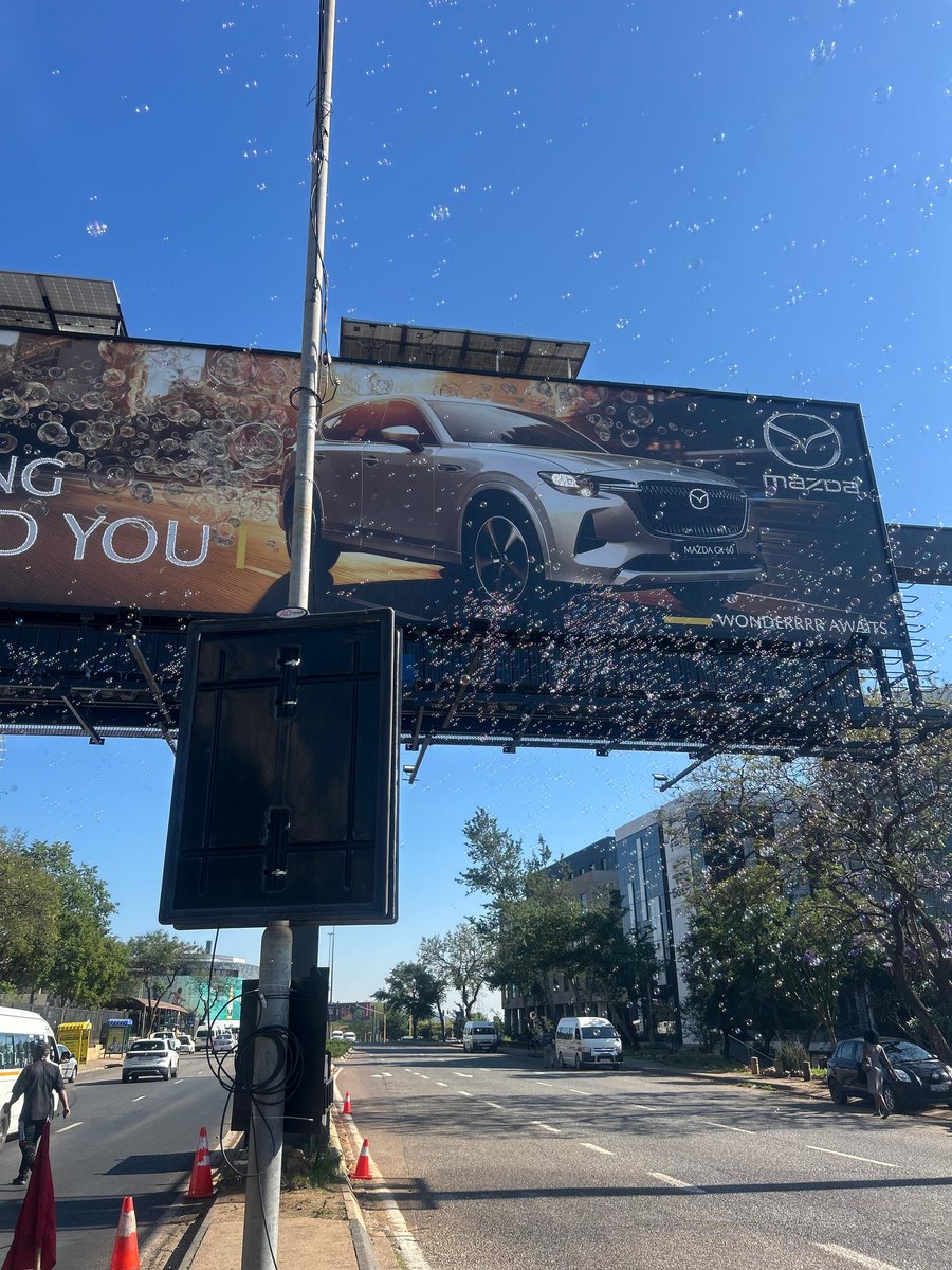 Kgothatso___'s tweet photo. Not me trying to act normal while a billboard is blowing bubbles over my head 😭✨ #BubbleBillboard https://t.co/dnCuYmRUSg