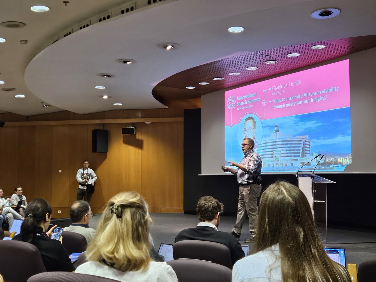 The brilliant <a href="/gfiorelli1/">Gianluca Fiorelli</a> on stage,  kicking off the conference #IntSSBarcelona with lots of insights about  how to maximise AI search visibility