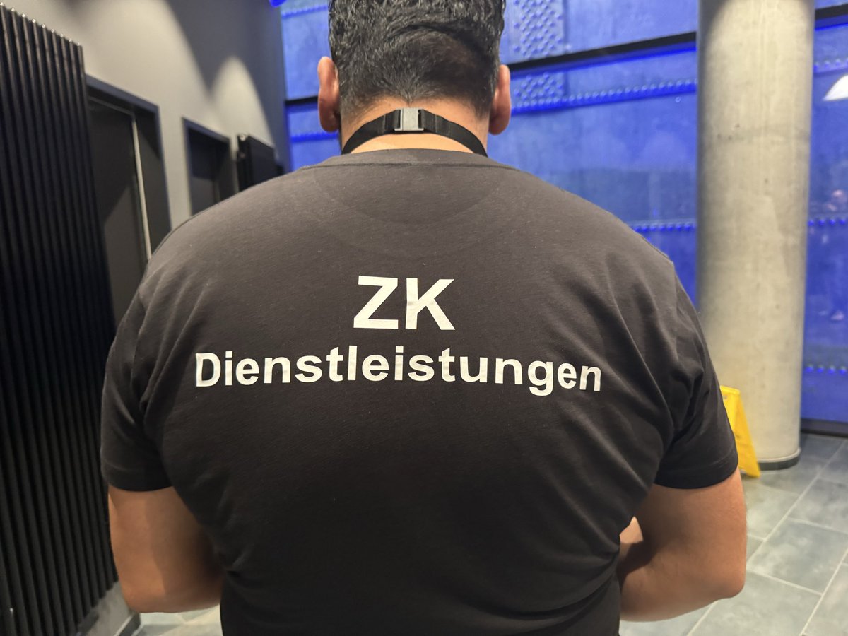 Even facility management at the <a href="/CardanoSummit/">Cardano Summit</a> has a blockchain focused branding - btw Dienstleistungen means services.