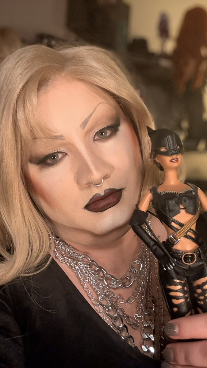 Hi, I’m Layne Coffin and this is my Halle Berry Catwoman Barbie doll from 2004. She has fucked up hair and a lazy eye. She is my most prized possession.
