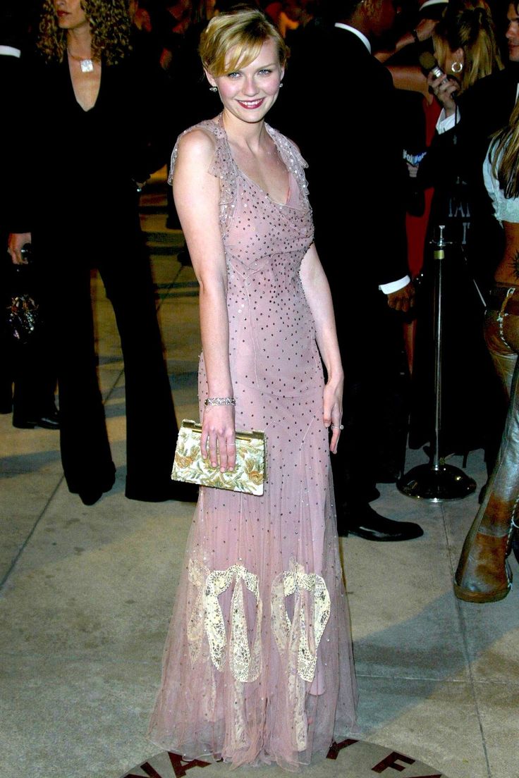 Kirsten Dunst in a shimmery light mauve Christian Dior gown by John Galliano at the 2002 Vanity Fair Oscar Party