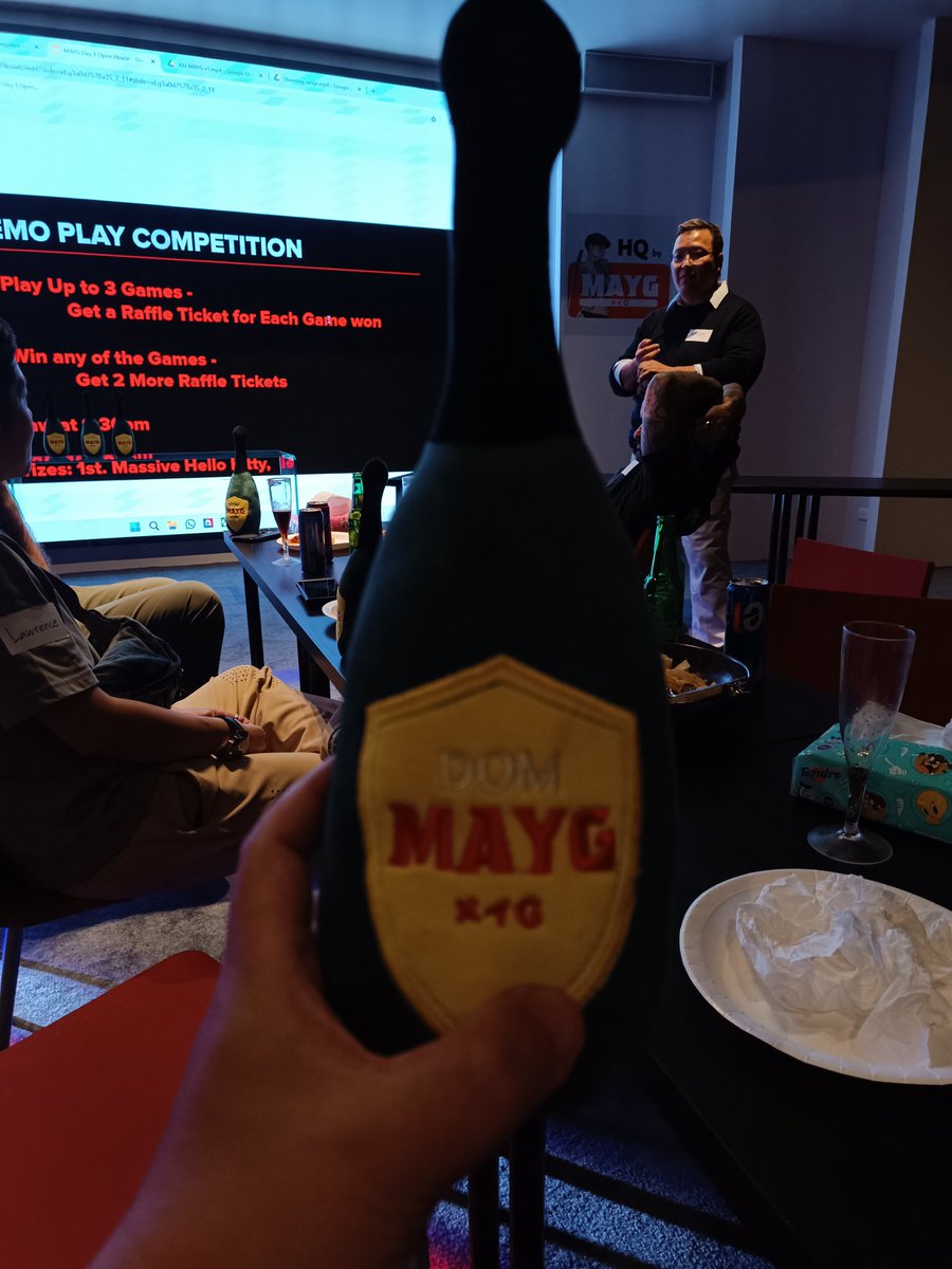ProTAE130871's tweet photo. At the MAYG HQ Open House in Bangkok was the best! 🙌

Great game demo, even better people, and the perfect mix of pizza, beer, and Web3 talk. I'm leaving with some fantastic loot – the Champagne 🍾 and MAYG NFT! 🥂

Thanks for  @SinjinMAYG, @MAYGnft! What a night! #MAYG #Bangkok https://t.co/eE61X7yq8Z