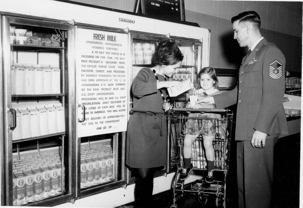 # TBT 🥛 In 1967, parents poured a glass of fresh milk for their daughter inside the Ankara Air Base, Turkey, commissary. #CommissaryHistory