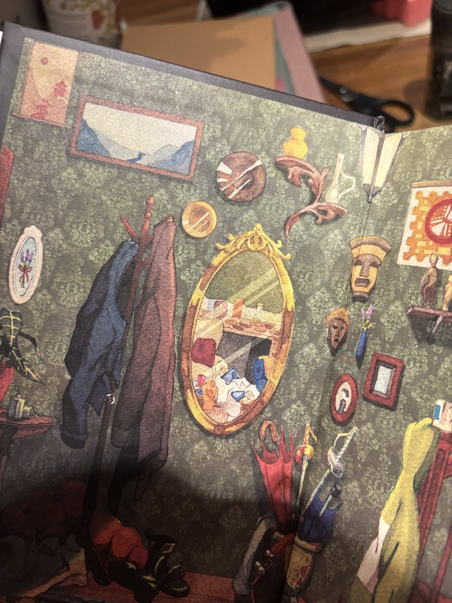 mooncakemin's tweet photo. so obsessed w these books but esp the amount of care and love has gone into them. the small details in all the books beginning &amp; end pages. the way there’s only 2 coats on the stand in TCS and 3 again in TEG. the mirror reflections… im getting emotional! 

#SaveLockwoodandCo https://t.co/m2GrEcxtgP
