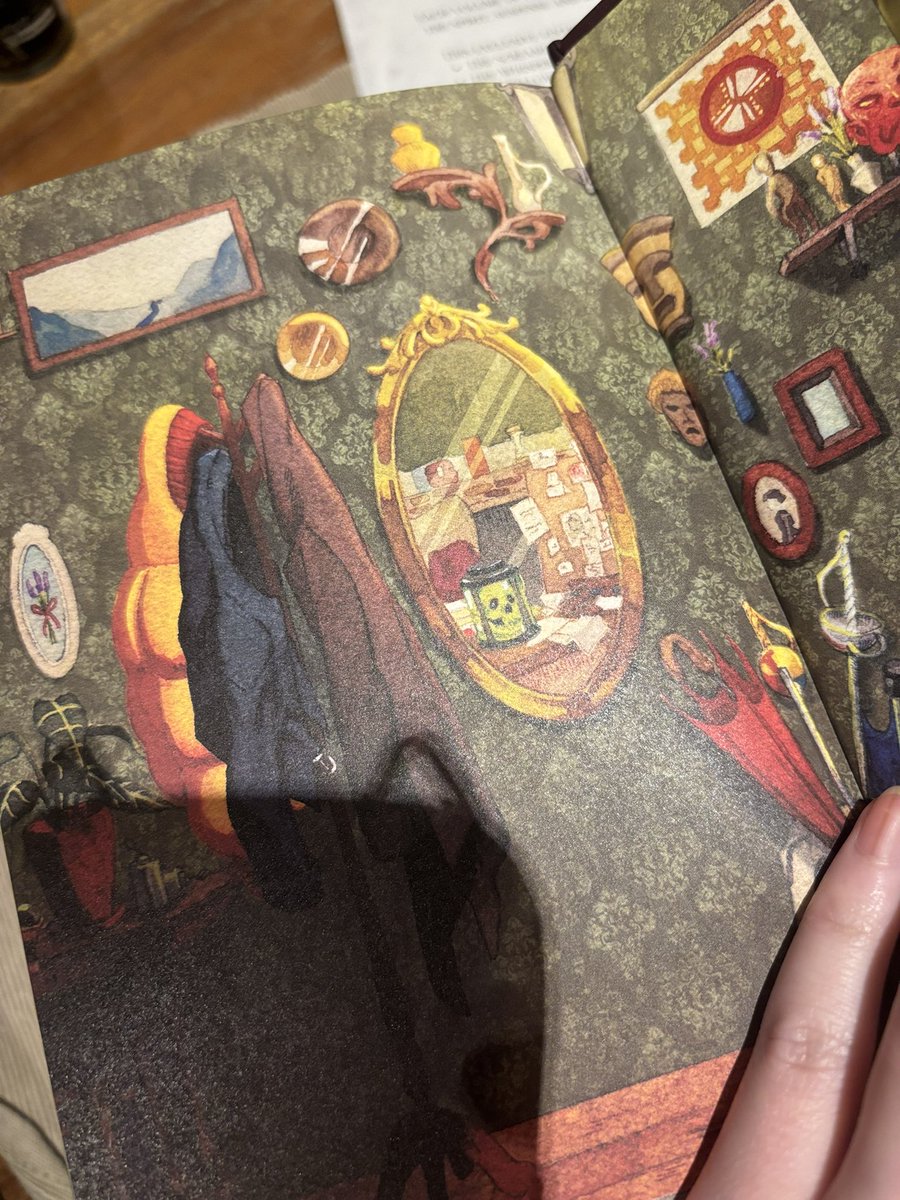 mooncakemin's tweet photo. so obsessed w these books but esp the amount of care and love has gone into them. the small details in all the books beginning &amp; end pages. the way there’s only 2 coats on the stand in TCS and 3 again in TEG. the mirror reflections… im getting emotional! 

#SaveLockwoodandCo https://t.co/m2GrEcxtgP