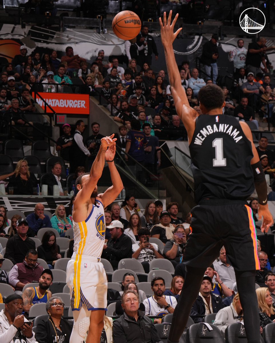 warriors's tweet photo. These photos of Stephen shooting over Wemby 🤯 https://t.co/Mg6UzTD90H