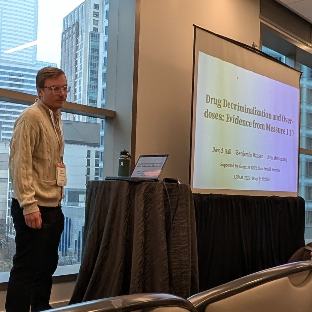 benconomics's tweet photo. Dave Hall presenting research with @q_econ on the impacts of drug legalization in Oregon.  Prior research has found different estimates using the same methods.  We replicate, reconcile and extend prior research.  @APPAM_DC 

#appam2025 https://t.co/tpHfscz2e9