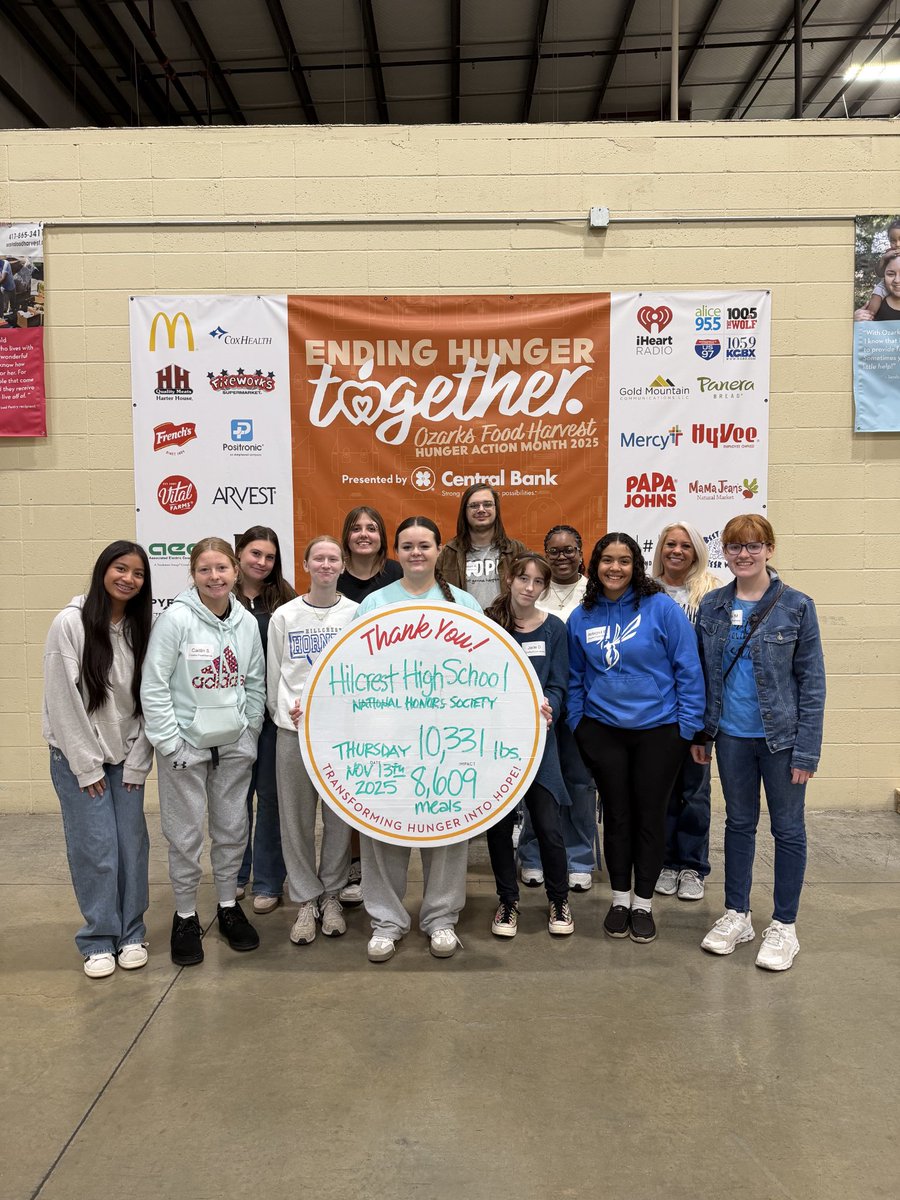 NHS completed their day of caring service event with Ozarks Food Harvest.