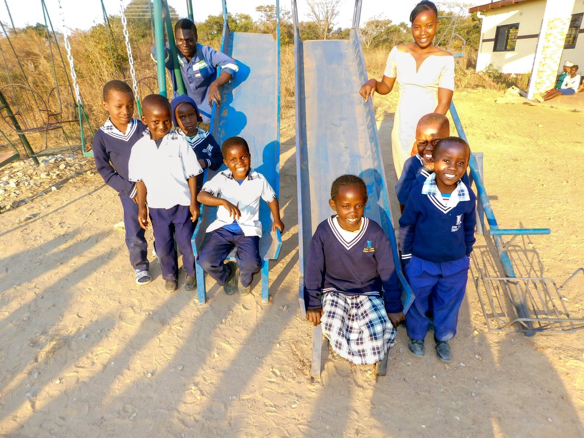 Chalice_US's tweet photo. With every joyful shout and gleeful giggle, it was clear — the new swing set was the best gift the Chalice Gift Catalog could have offered!   "This has brought ioy and excitement to our children," says Sister Lucy, a leader in our Serenje site in Zambia. https://t.co/uYXtPIc63z