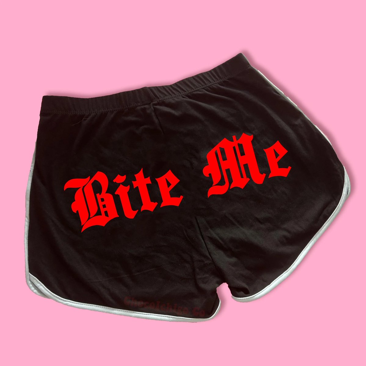 Wearing these.

On her b u t t !