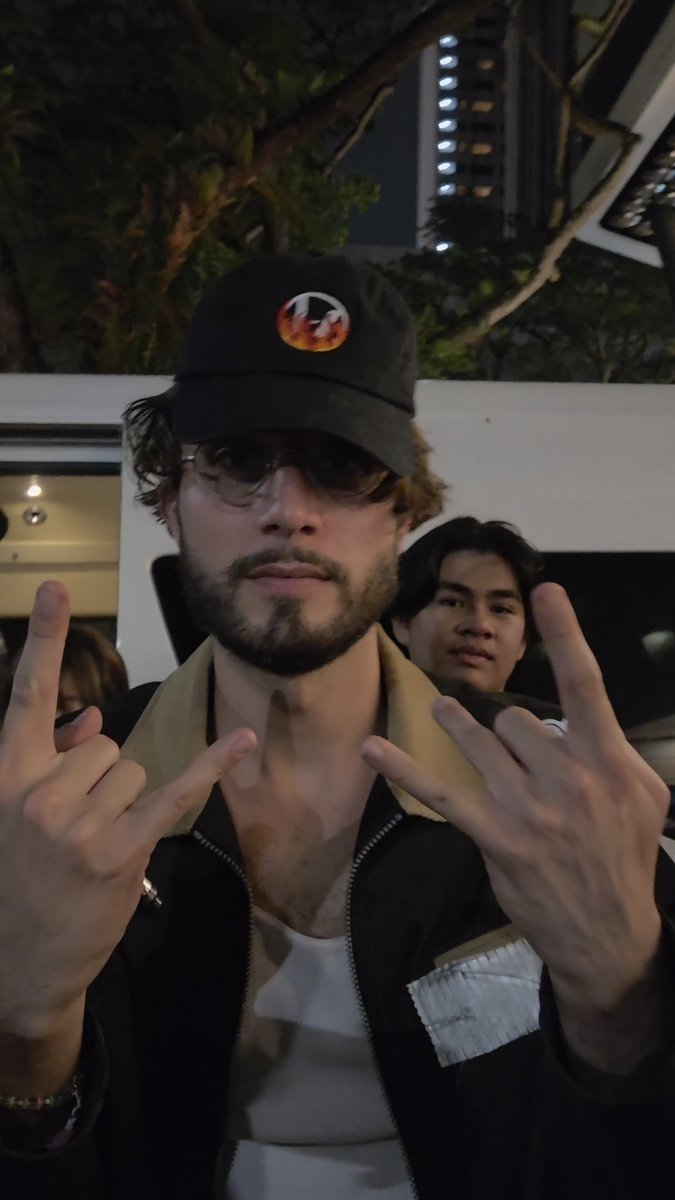 bbno$ stuns with a Twenty One Pilots cap in recent photo.

"None of these words are in the bible"