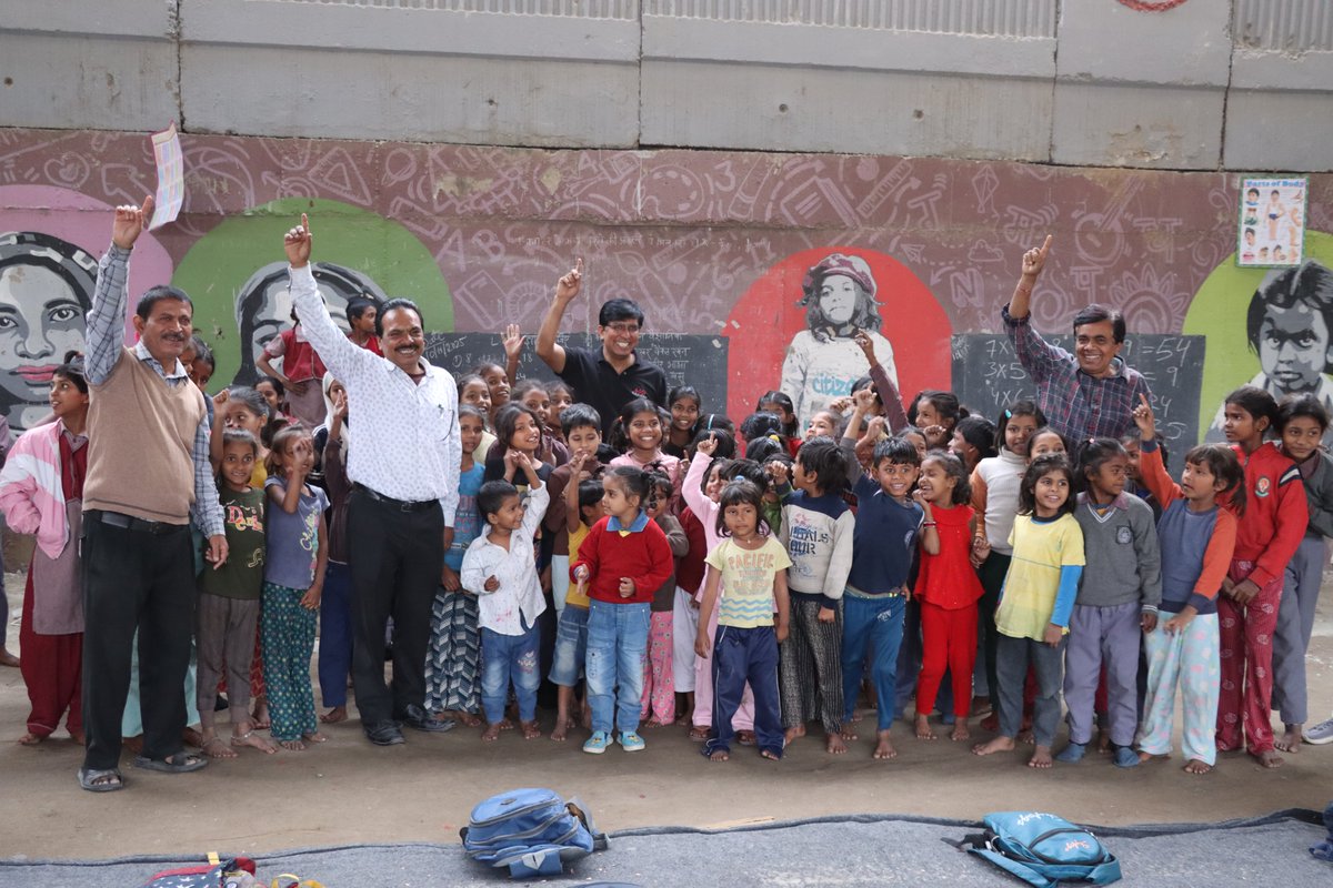 “Sir, aap bhi drawing banaoge?”
That’s how it started.
A small voice, a big smile, and a box of broken crayons.

I was at the Free School Under The Bridge in Delhi,
Surrounded by young girls, giggling, drawing, dreaming.
At first, I just watched.
Then I picked up a crayon.

We