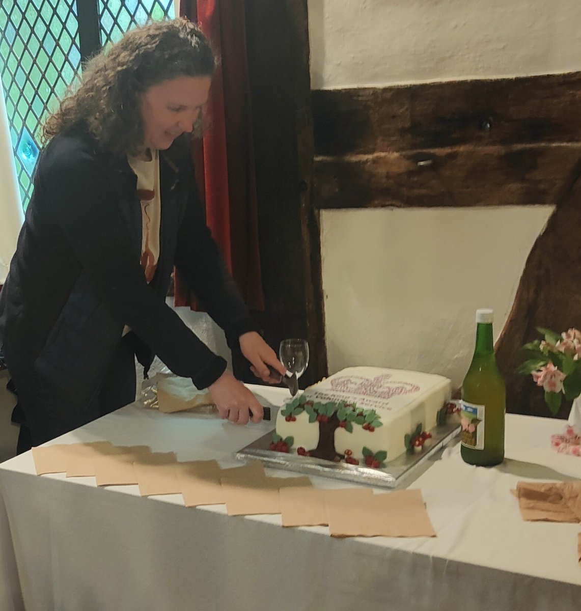 SWWren's tweet image. Cutting the cake to celebrate Colwall Orchard Group being recipients of the King's Award for Voluntary Service #KAVS25