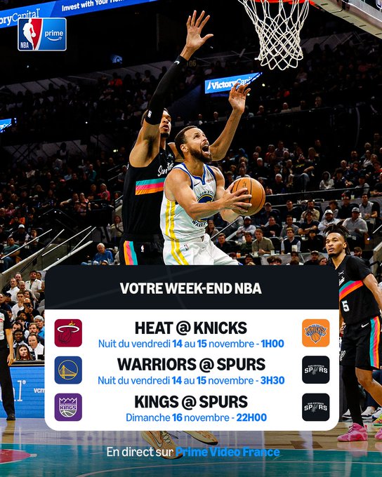 Basketball player Stephen Curry in Golden State Warriors yellow and blue uniform jumps high with ball in hand toward hoop defended by Sacramento Kings player in purple uniform during NBA game at Chase Center arena with Invest in Central logo and NBA Prime Video branding on court crowd in stands schedule overlay shows Heat at Knicks November 14 1:00 AM Warriors at Spurs November 15 3:30 AM Kings at Spurs November 16 10:00 PM all in direct on Prime Video France