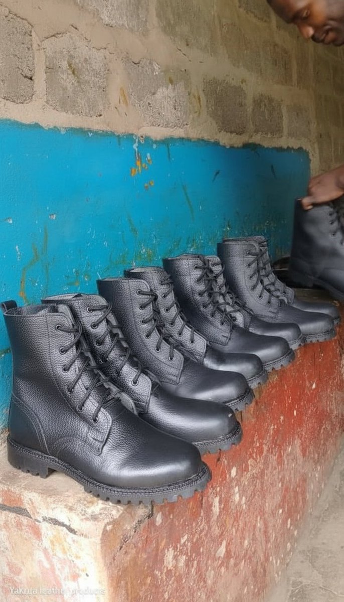 KasiEconomy's tweet image. Zambian Shoemaker Esau Valende made boots for a Zambian security company. Africa is rising...