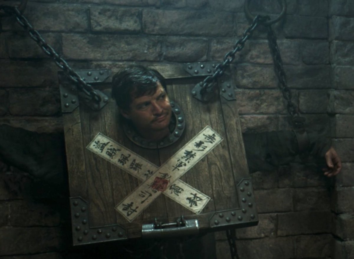 Pero getting imprisoned was one of the best scenes in the movie.
They locked him up in this ancient Chinese style, and they even put a tag with “Bandit Pero” written in Chinese on it.