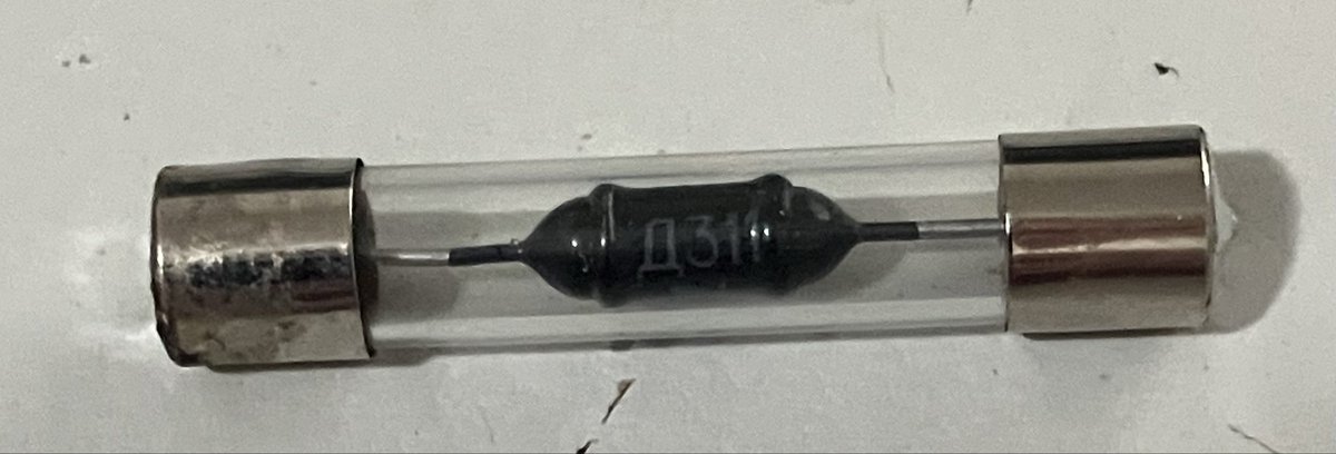 Cute little idea for crystal radio building / restoration: a diode (Soviet era Д311 in this case, which has the lowest Vf I’ve ever seen compared to other germanium diodes) is mounted inside a 3AG fuse body, so it can be clipped into a standard neat fuseholder.