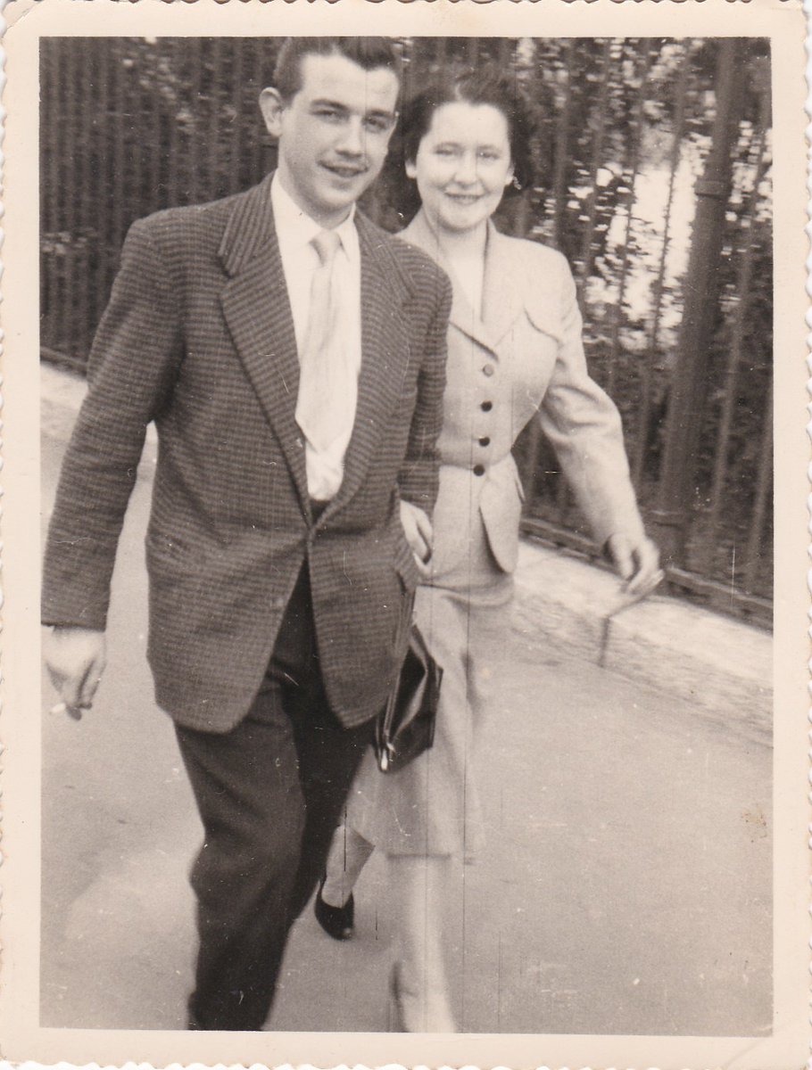my grandparents photographed in the streets of paris, c. 1957.