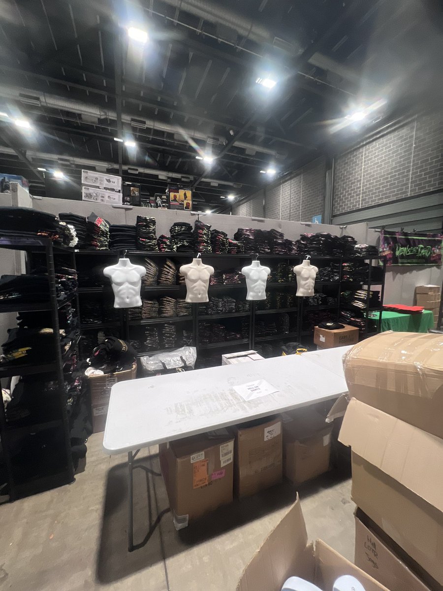 hellonshirts's tweet image. Rob and Matt are almost all set up for Liverpool tomorrow! Just gotta dress the torsos and set the table up! Next to our good friend Dean too which is a bonus.
