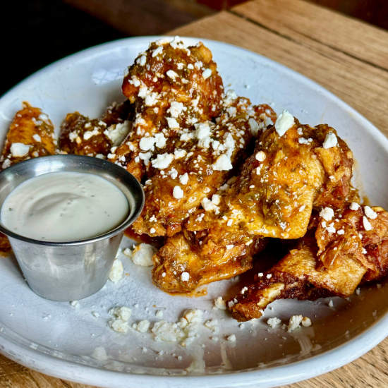 Weekend Specials - Nappytime Platter! Boneless center cut pork chops glazed with a rich maple- Dijon-pumpkin sauce. Served with mashed potatoes and oven roasted butternut squash-apple mélange. Plus the #9 Burrito and those ChimiCheesi Wings too!