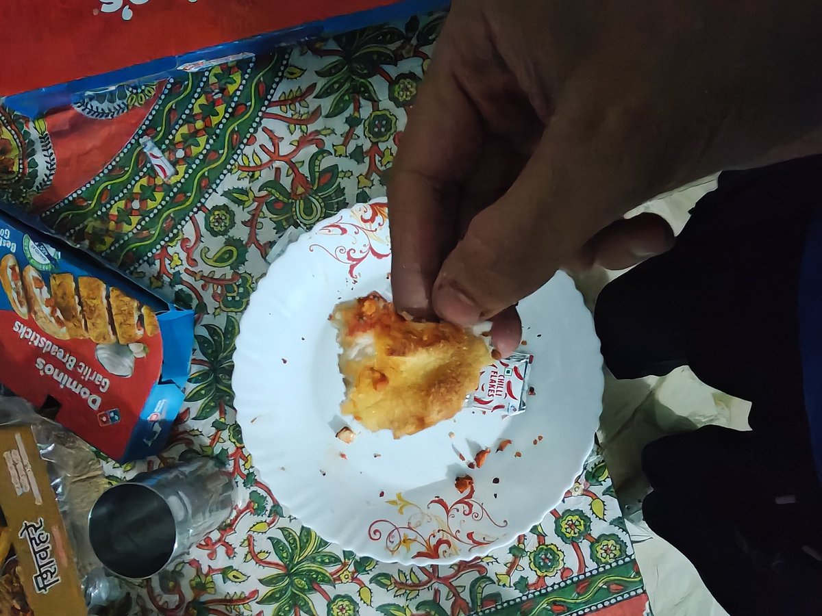TMK11707's tweet photo. @dominos_india look at the pathetic state of the pizza that I was sent. Not only was it 30 mins late it was cold and stale as well. Please look into this https://t.co/mQESGrtgoF