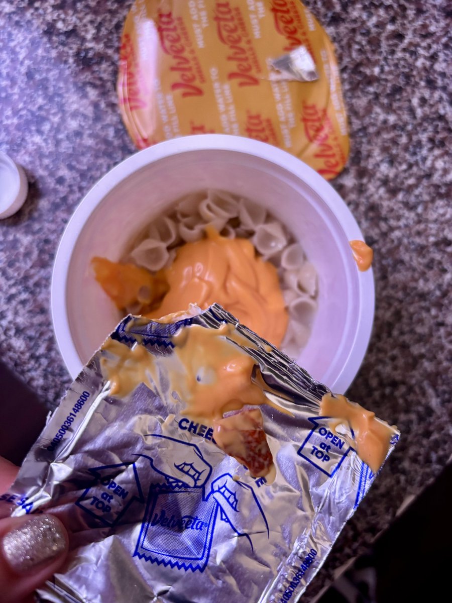 UnMelodrama's tweet photo. @CheesyVelveeta I love you, but my cheese pouch had something mysterious inside. Blink twice if this is normal. https://t.co/FCqCAWqY7l