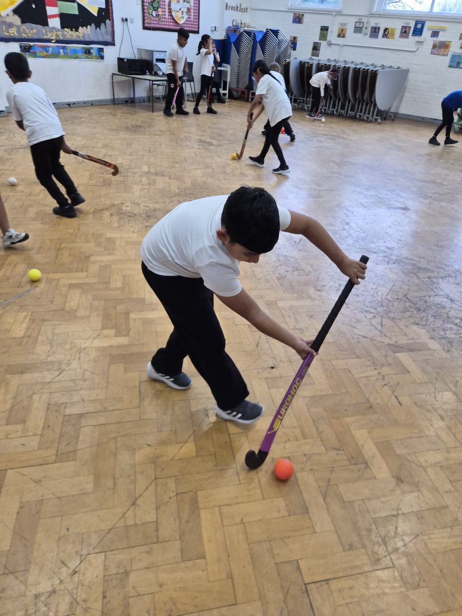 Year 4 are doing really well developing their hockey skills in PE this half-term. Today we practiced passing with accuracy and stopping the ball. Good job guys!