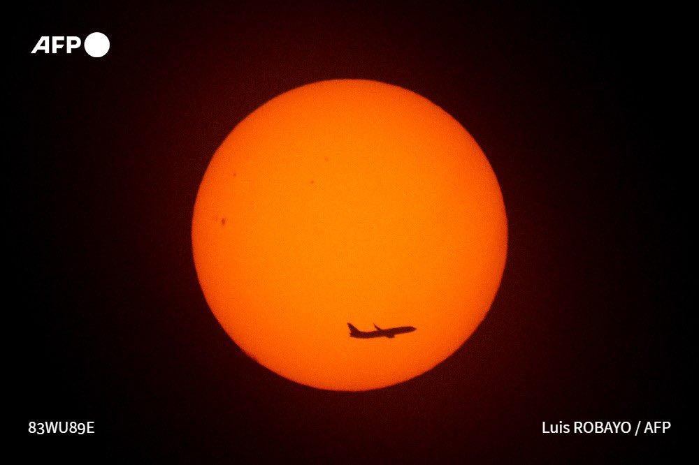 #TOPSHOT - An aircraft flies at sunrise on November 13, 2025 in Buenos Aires, Argentina. 

Photo by <a href="/LuisRobayo/">Luis Robayo</a> <a href="/AFP/">AFP News Agency</a> <a href="/AFPphoto/">AFP Photo</a>