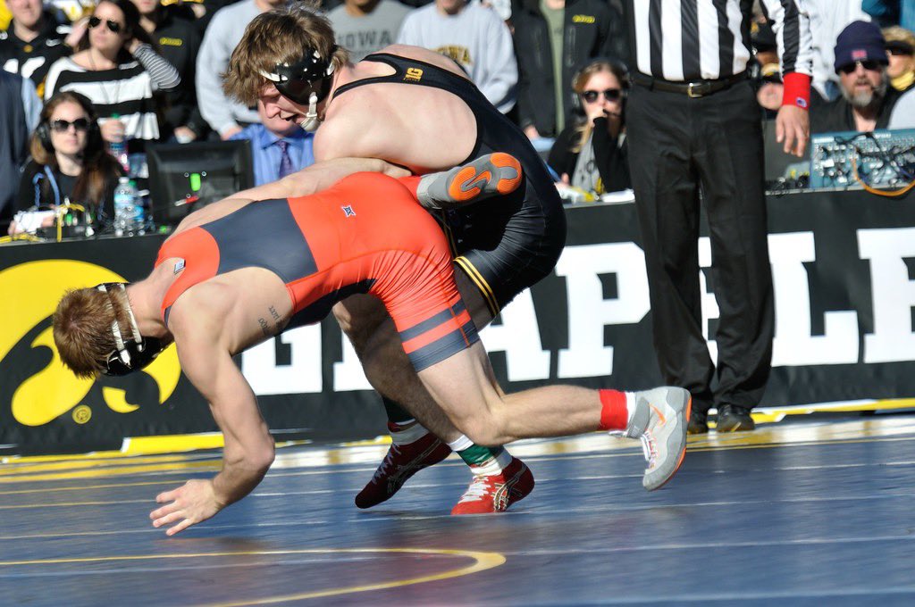 rossbchek's tweet photo. 10 years since the Grapple on the Gridiron!

The Iowa Hawkeyes wrestled top ranked Oklahoma State in a historic dual inside Kinnick Stadium. 

Iowa won the dual 18-16 in front of a record setting 42,287 fans on November 14, 2015. 

📷 @webcentrick https://t.co/tii25lLbfS