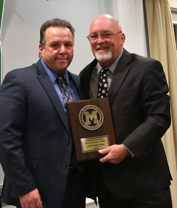 MikeRedding1's tweet photo. Congrats to George Giannouloudis on his induction into the Soccer Hall of Fame at MHS for his leadership as Head Coach of the Boys Soccer Team from 1998-2007! George was presented to the Mansfield All-Sports Hall of Fame by his good friend &amp; current Head Coach Steve Sheridan! https://t.co/CVs79AmjOp