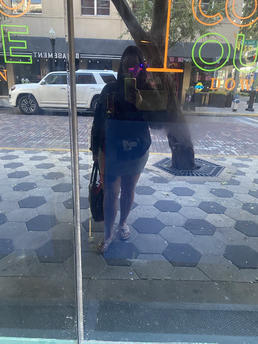 Embracing my inner Floridian by going out with a mini skirt, chancletas and a hoodie.