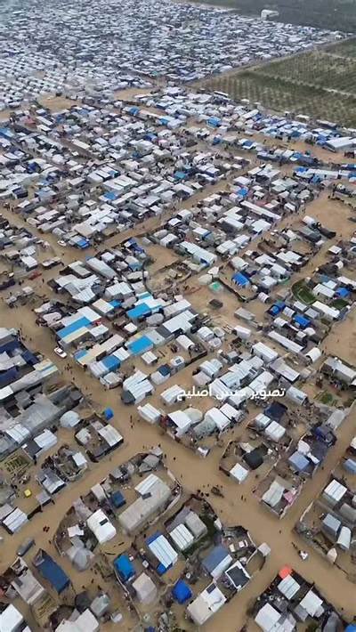 Tents of displaced Palestinians in Gaza Strip are drowning in rain water with no electricity, heating, or other facilities.