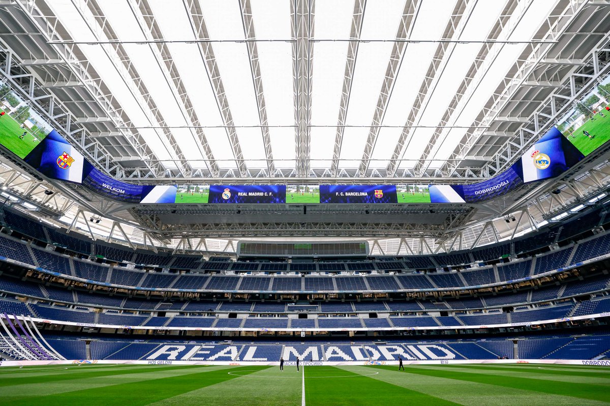 Daktronics's tweet photo. The #NFL is headed to Madrid! On Sunday, Santiago Bernabéu Stadium will host the Washington @Commanders vs @MiamiDolphins under our massive Halo display. The stadium also recently installed two video walls on each side of a hallway to highlight players. Enjoy the game! #DakPro https://t.co/W0am9rCIBu