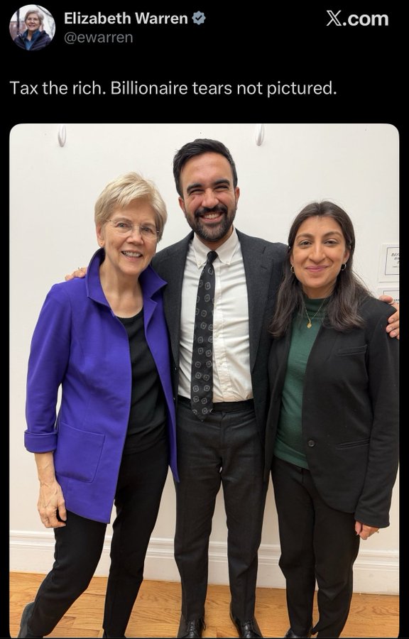 A group photo shows three people standing together indoors against a plain wall with coat hooks. Elizabeth Warren, an older woman with short gray hair wearing a purple jacket, black top, and black pants, stands on the left smiling and has her arm around the middle person. The middle person is a man with dark hair and a mustache, dressed in a white shirt, striped tie, and dark suit, smiling. On the right is a woman with long dark hair wearing a green top and black pants, smiling with her arm around the man. The photo is duplicated in two screenshots, one with a Twitter overlay from Elizabeth Warren and another from Zohran Mamdani.