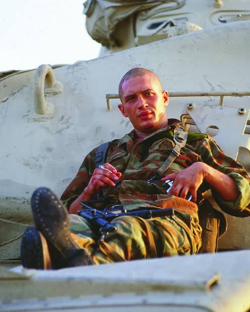 *Looks at his father's portraits during his services in the military and Pete's dad and Kassidy and Eddie Brock* The hell?