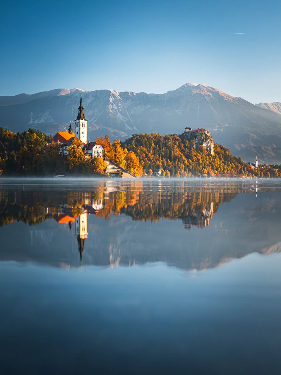 ExploringSlo's tweet image. A classic 😍 In autumn, Bled glows with golden hues, its tranquil lake reflecting brilliant colors as the Alps stand majestic in the background.
Photo by 📸 @dejanslr